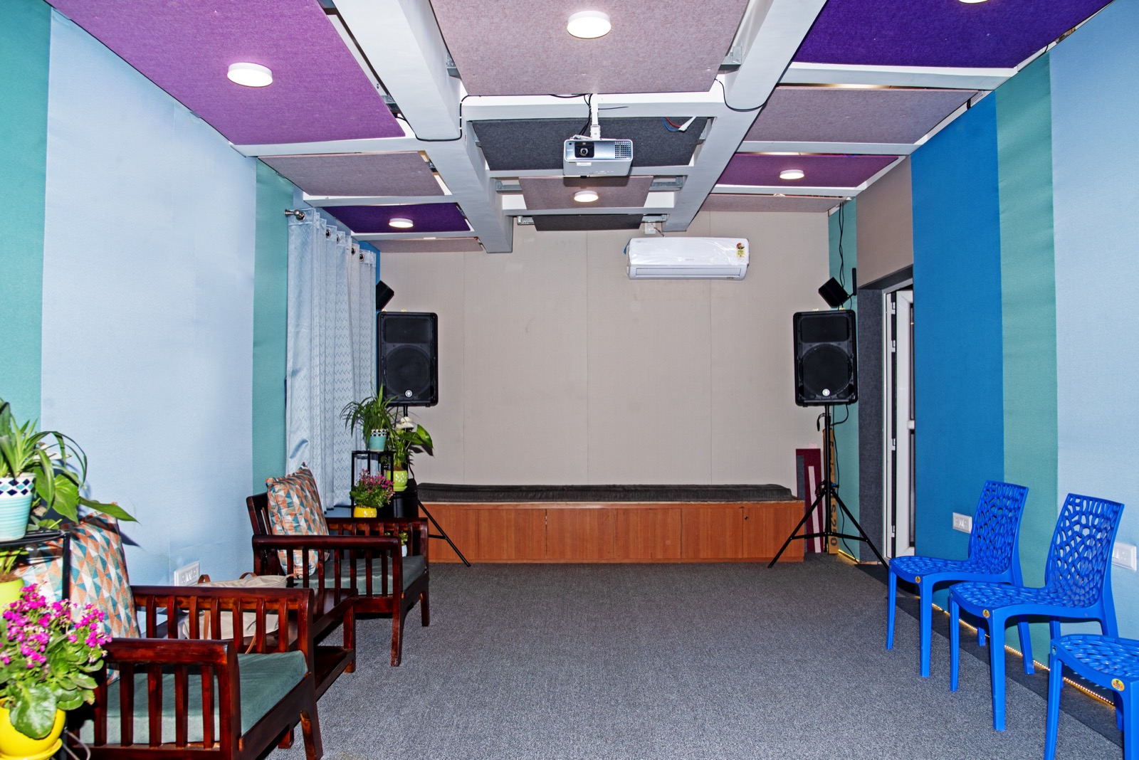 Wide view of Varnam Studio's stage and acoustic treatment